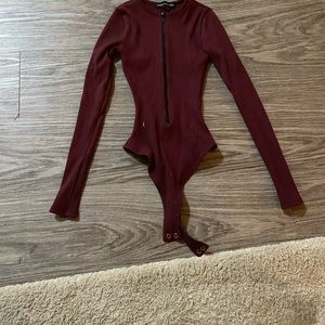 Naked Wardrobe bodysuit with a zipper